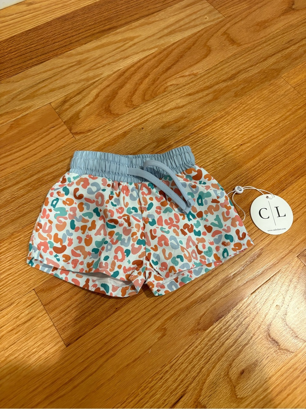 Caden Lane Coral & Teal Animal Print Swim Shorts